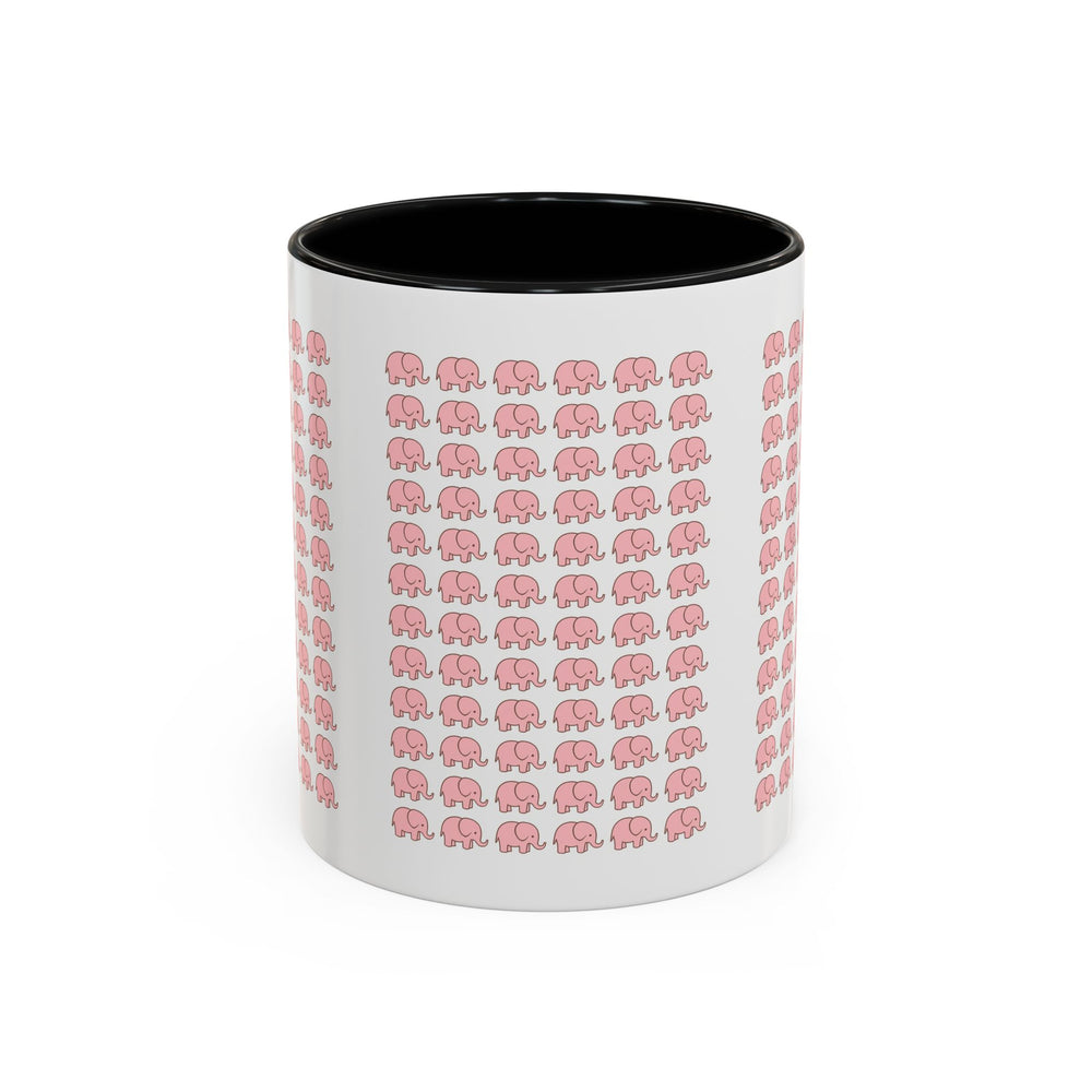 Happy woman enjoying morning coffee in cute pink elephant ceramic mug at kitchen table