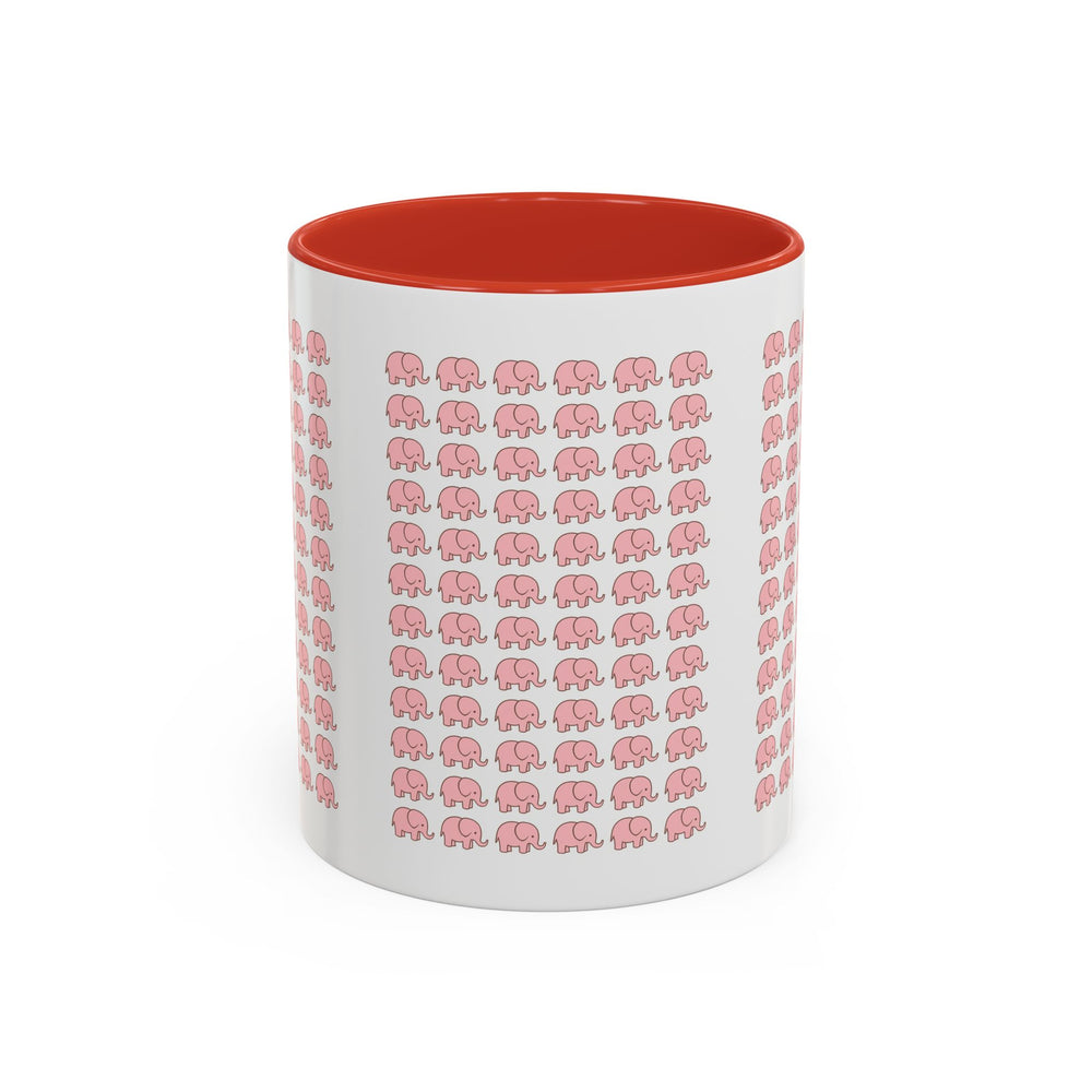 White mug with pink elephant pattern and red interior on a white background