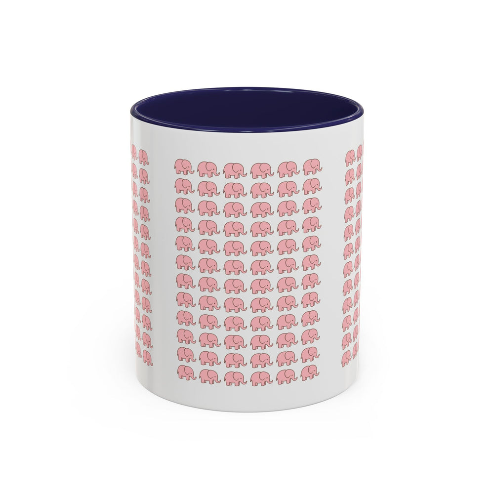White mug with pink elephant pattern and navy interior on a white background