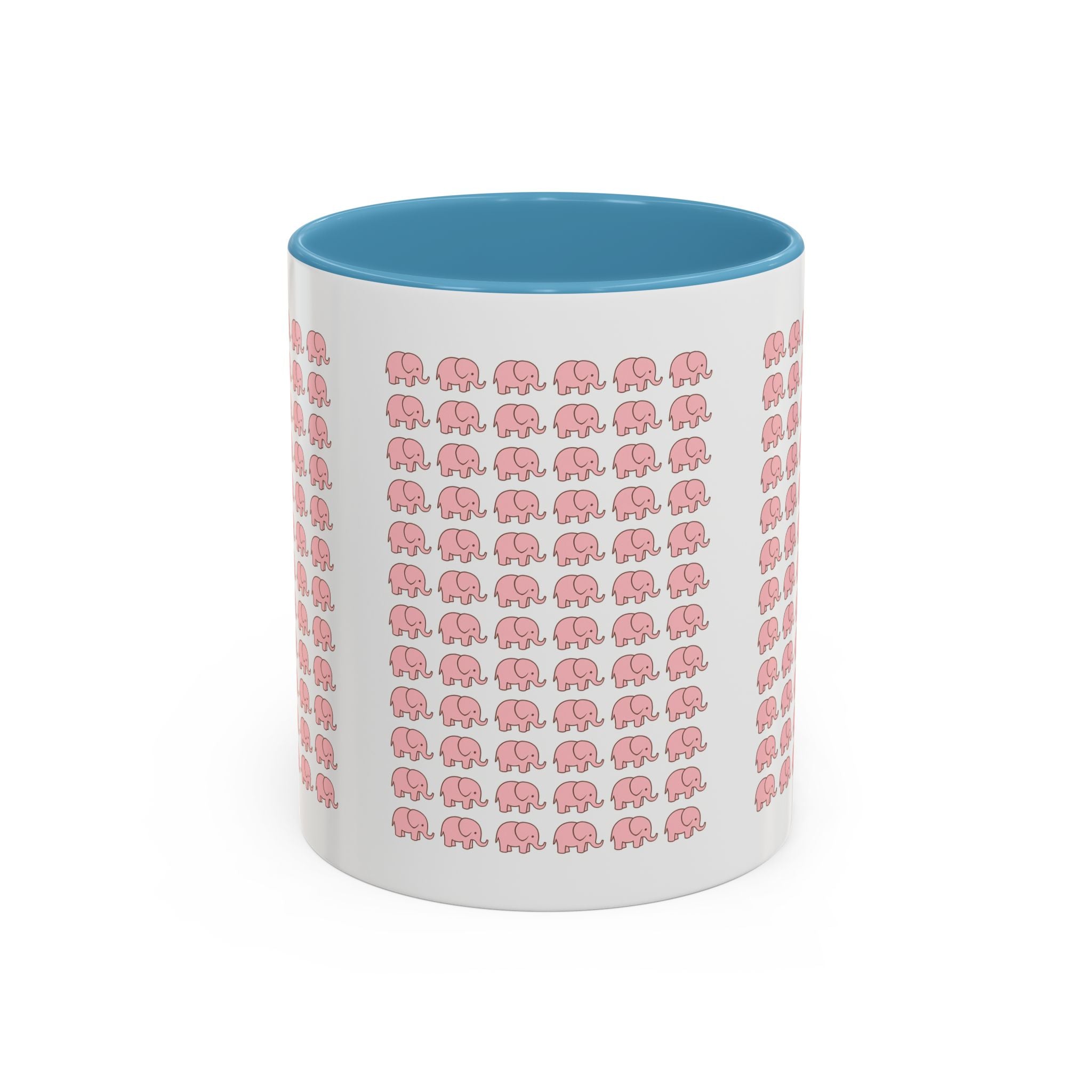 Pink elephant mug filled with coffee steam rising in cozy morning light setting